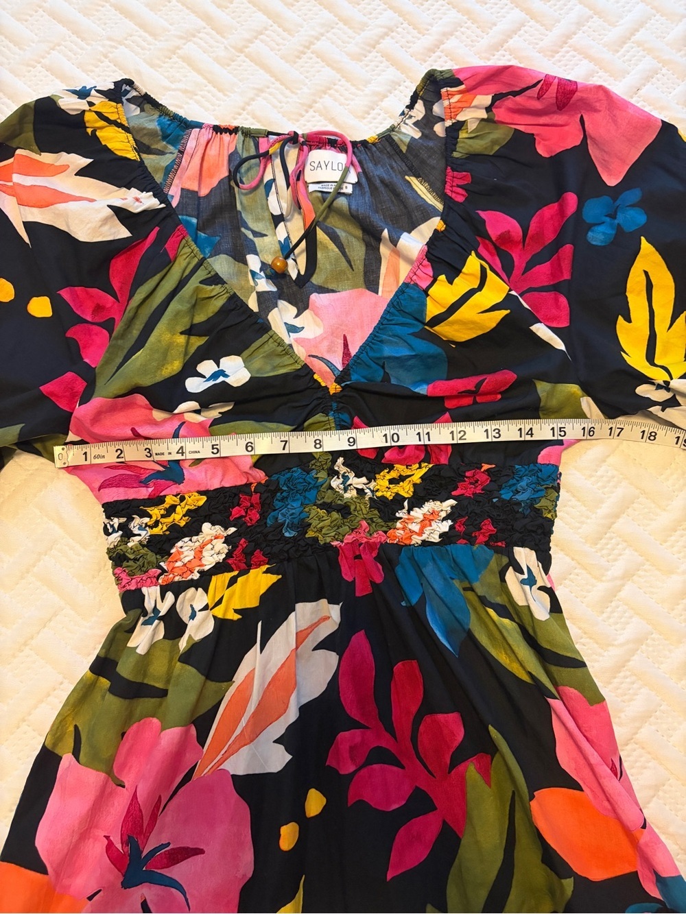 SAYLOR | Black Floral V-Neck Mini Dress with Bright Blooms and Smocked Waist - Picture 8 of 10